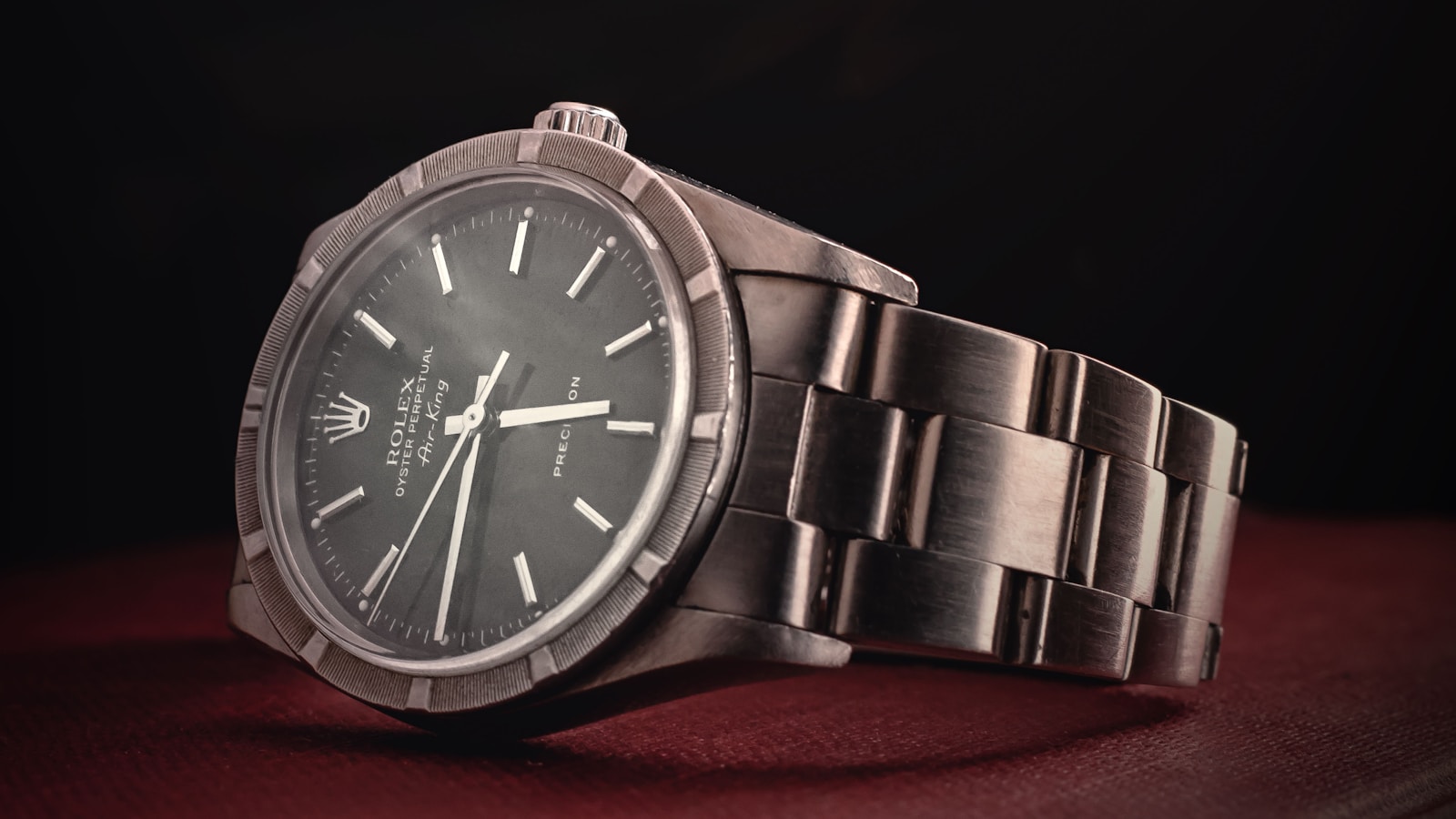 Three Soviet watches arranged on aged paper — a Vostok, Raketa, and Pobeda